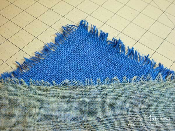 Creating surface texture with burlap and scrim