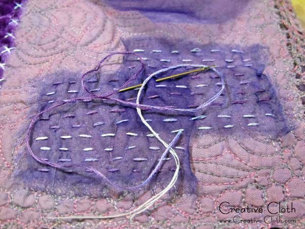 Creative sewing in shades of purple: a little handstitching