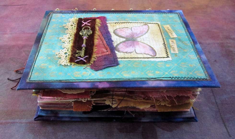 How to make a Handmade Journal with the Stitches Hidden in the Spine