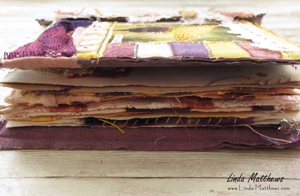 The Transitions Journal - a stitched mixed media fabric journal