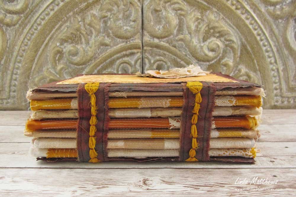 The Book of Days - a stitched mixed media fabric journal