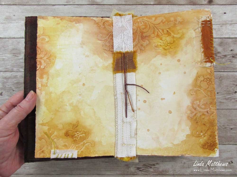 The Book of Days - a stitched mixed media fabric journal